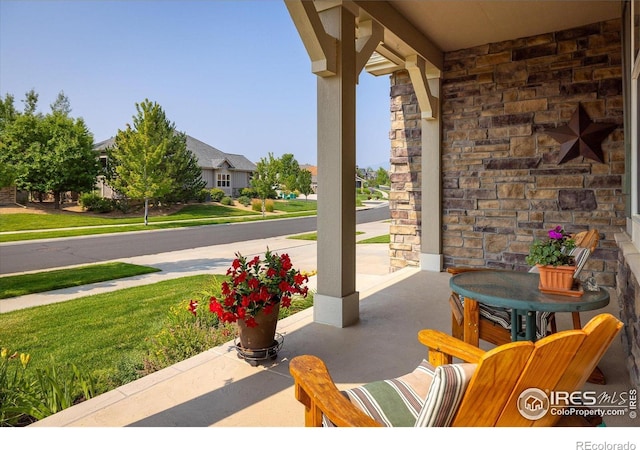 13943 W 87th Ln, Arvada, CO 80005 - porch featuring a residential view