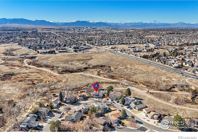 bird's eye view featuring a residential view and a mountain view