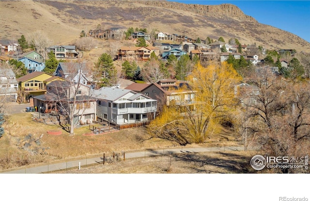 bird's eye view featuring a mountain view and a residential view