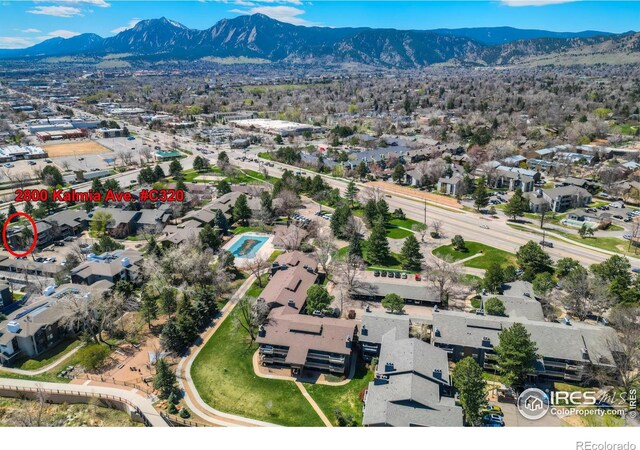 birds eye view of property featuring a residential view and a mountain view