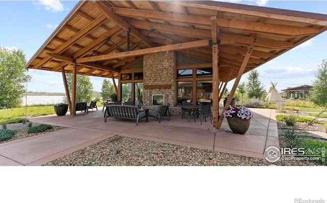 4110 S Park Dr, Loveland, CO 80538 - view of patio featuring an outdoor hangout area and a gazebo
