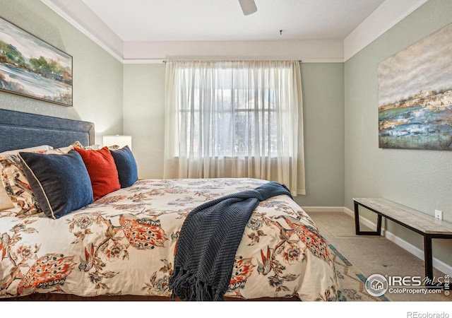 bedroom featuring a ceiling fan, carpet flooring, and baseboards