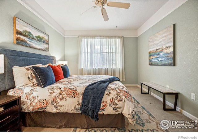 bedroom featuring ceiling fan, carpet flooring, and baseboards