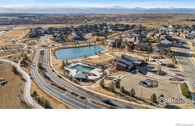 bird's eye view featuring a residential view and a mountain view