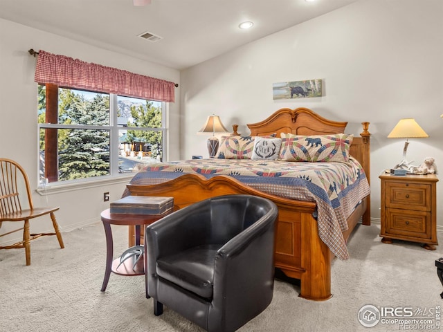 bedroom featuring light carpet, recessed lighting, visible vents, and baseboards