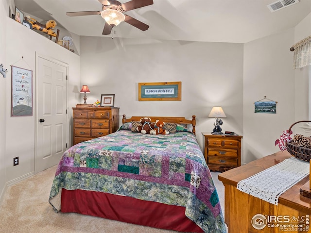 bedroom featuring ceiling fan, carpet flooring, and visible vents