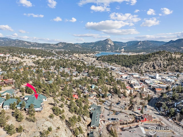 bird's eye view featuring a water and mountain view