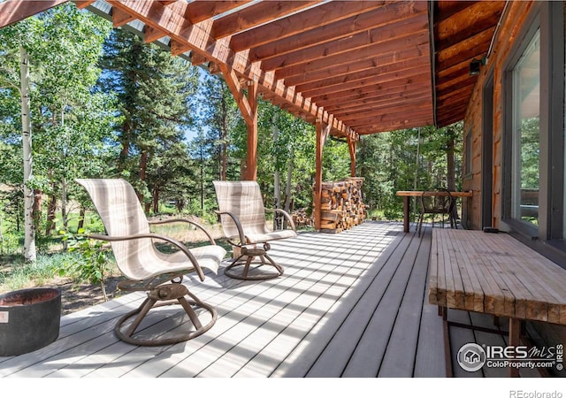 wooden deck with a pergola