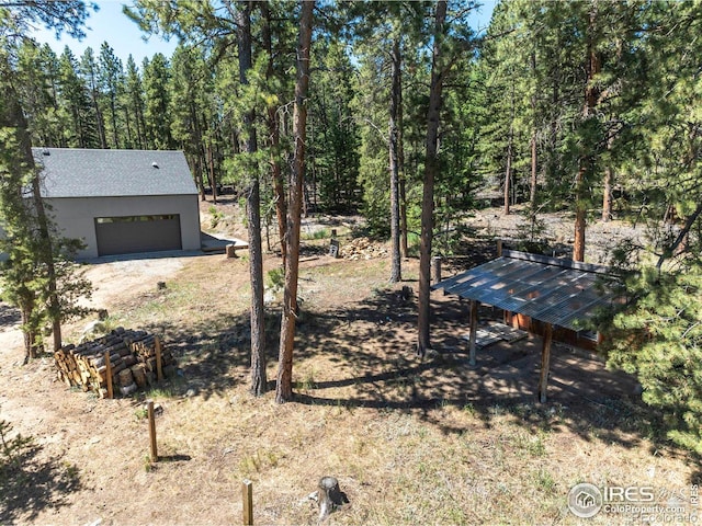 view of yard featuring a garage