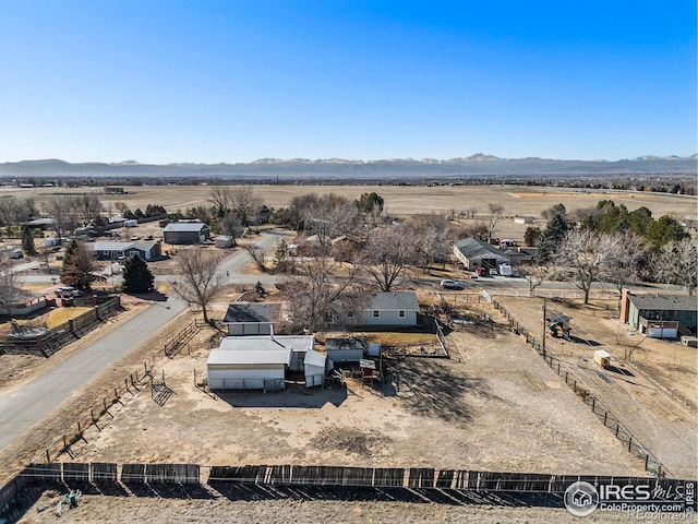 birds eye view of property featuring a rural view and a mountain view