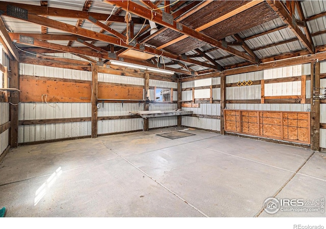 garage featuring metal wall