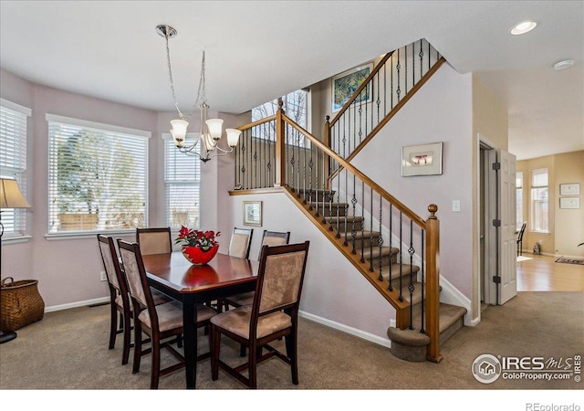 carpeted dining area with stairs, recessed lighting, a chandelier, and baseboards