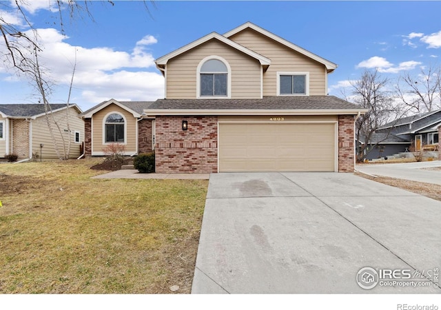 view of front of property featuring driveway, a shingled roof, an attached garage, a front lawn, and brick siding