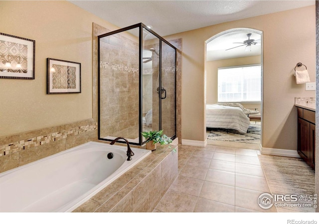 full bath with a garden tub, a stall shower, connected bathroom, and a ceiling fan