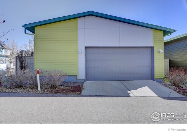 garage featuring driveway