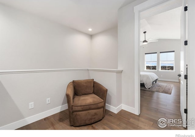 2748 Prairie Flax St, Berthoud, CO 80513 - living area with baseboards, ceiling fan, wood finished floors, and lofted ceiling