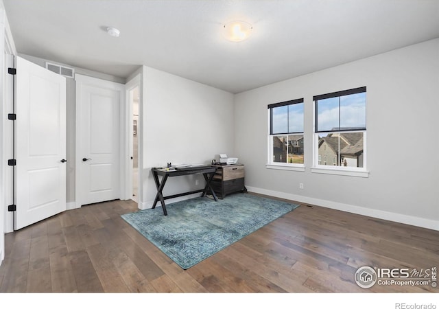 2748 Prairie Flax St, Berthoud, CO 80513 - interior space with baseboards, dark wood finished floors, and visible vents
