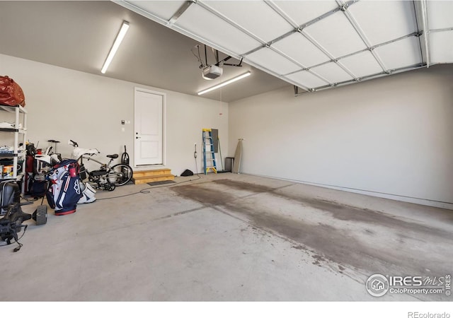 2748 Prairie Flax St, Berthoud, CO 80513 - garage with a garage door opener