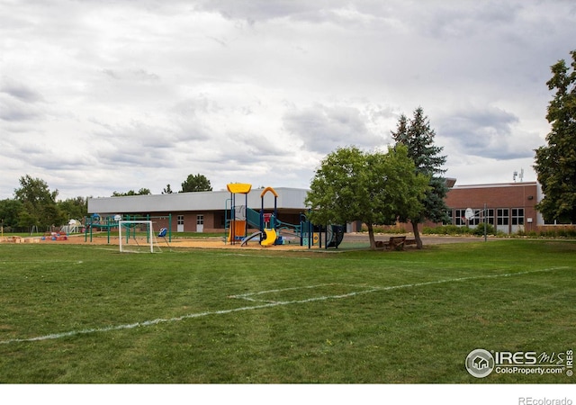 communal playground featuring a yard