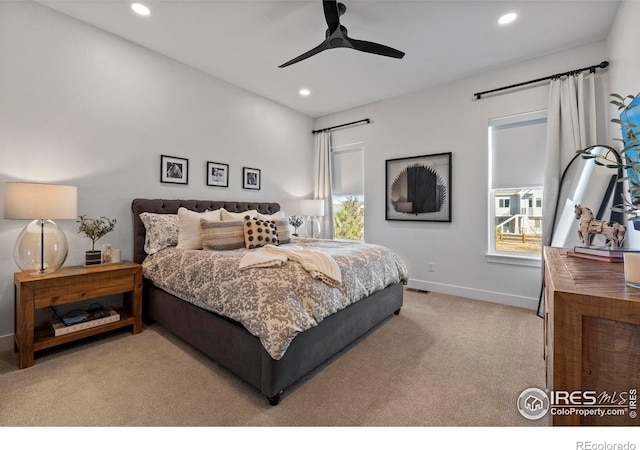 bedroom with multiple windows, carpet flooring, and recessed lighting