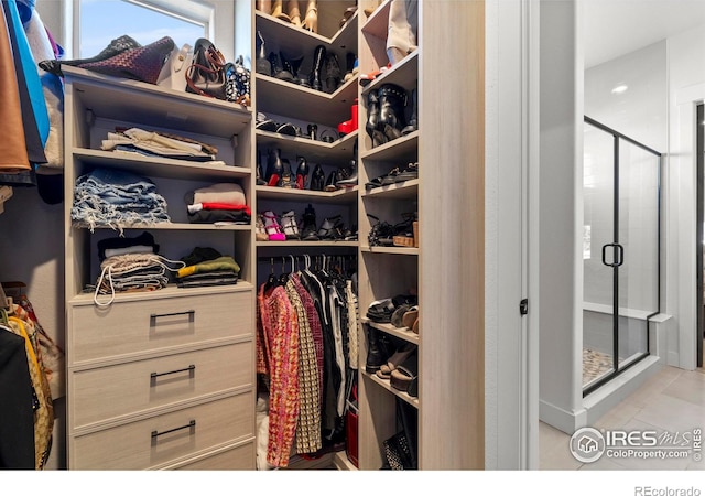 walk in closet featuring tile patterned floors