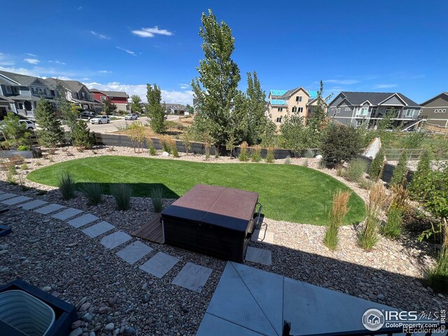 view of yard featuring a residential view