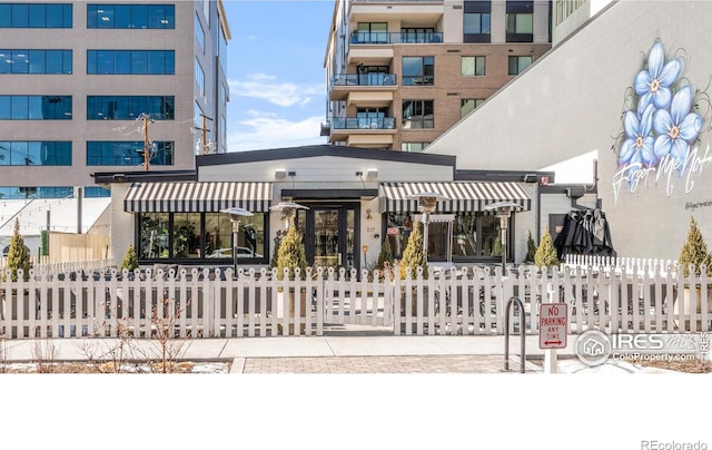 exterior space with a fenced front yard