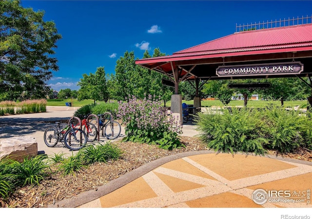 surrounding community with a patio and a gazebo