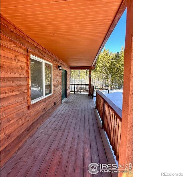 wooden terrace with covered porch