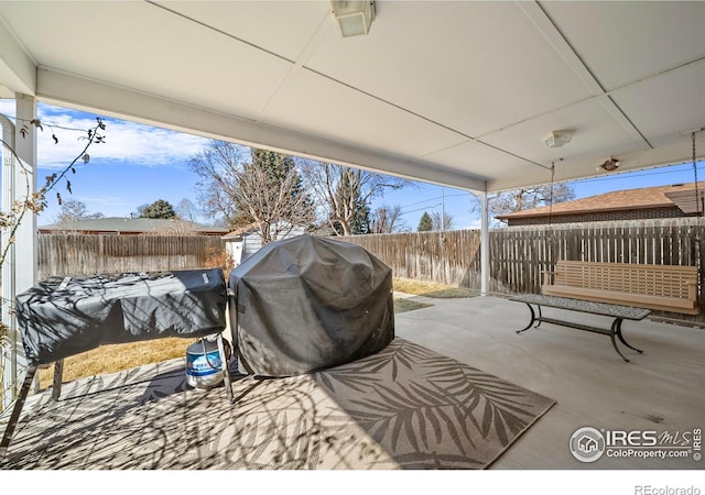 view of patio / terrace featuring grilling area and a fenced backyard