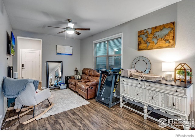 interior space featuring ceiling fan and wood finished floors