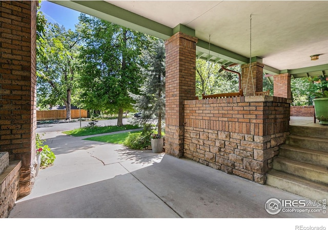 view of patio with fence