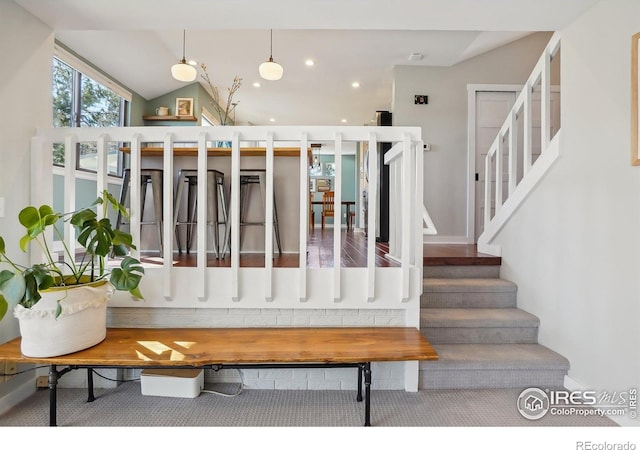 mudroom with vaulted ceiling and recessed lighting