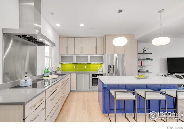 kitchen featuring a breakfast bar, appliances with stainless steel finishes, backsplash, a center island, and island exhaust hood