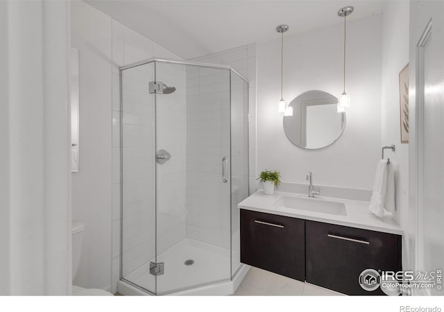 full bath with toilet, a shower stall, and vanity