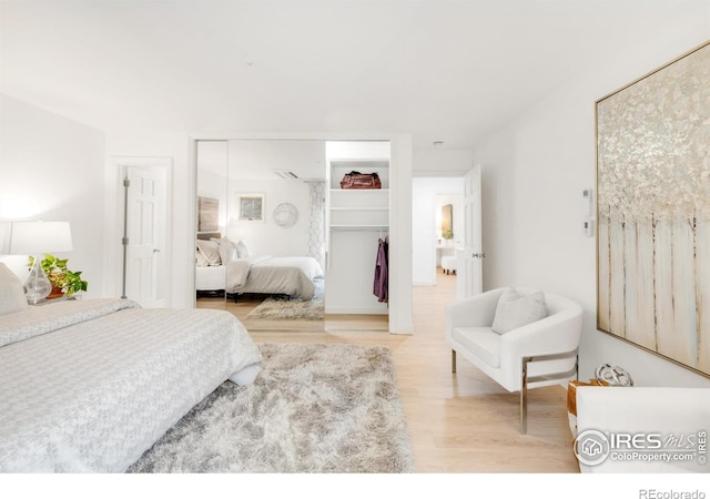 2444 9th St Unit 4, Boulder, CO 80304 - bedroom featuring wood finished floors and a closet