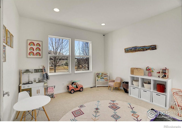 recreation room featuring baseboards, carpet floors, and recessed lighting