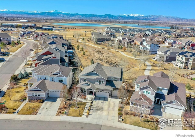 bird's eye view featuring a residential view and a mountain view