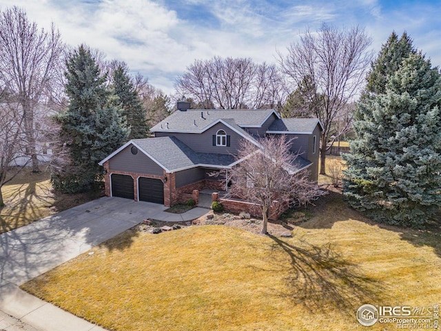 view of front of property with brick siding, concrete driveway, a front yard, roof with shingles, and a garage