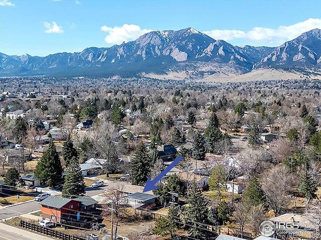 exterior space featuring a mountain view