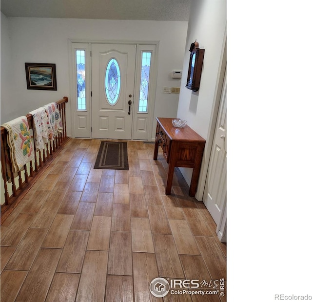 entryway with light wood-type flooring