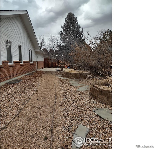 view of yard with fence