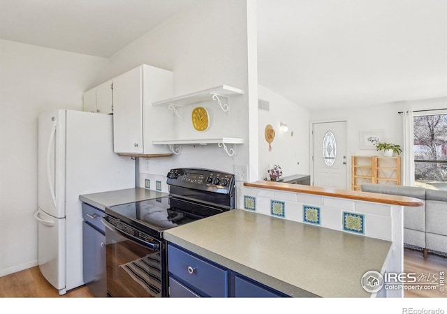 kitchen featuring visible vents, white cabinets, black / electric stove, blue cabinetry, and open shelves