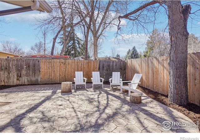 view of patio with a fenced backyard