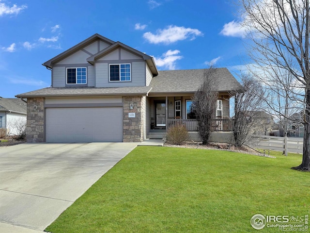 view of front of home featuring a porch, a shingled roof, concrete driveway, an attached garage, and a front yard