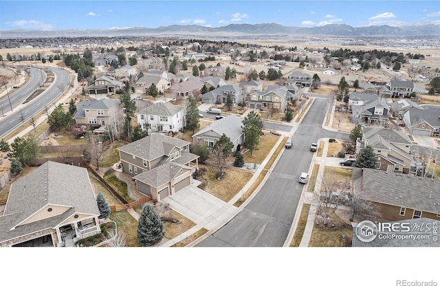 bird's eye view with a residential view and a mountain view