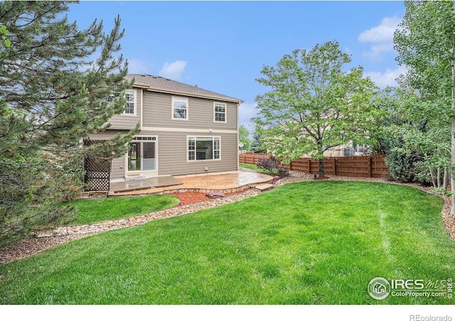 4910 Crimson Star Dr, Broomfield, CO 80023 - rear view of property with a patio area