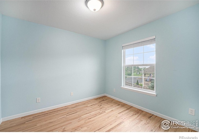 4910 Crimson Star Dr, Broomfield, CO 80023 - unfurnished room with wood finished floors and baseboards