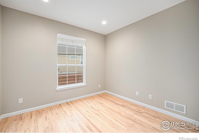 4910 Crimson Star Dr, Broomfield, CO 80023 - unfurnished room featuring wood finished floors and recessed lighting