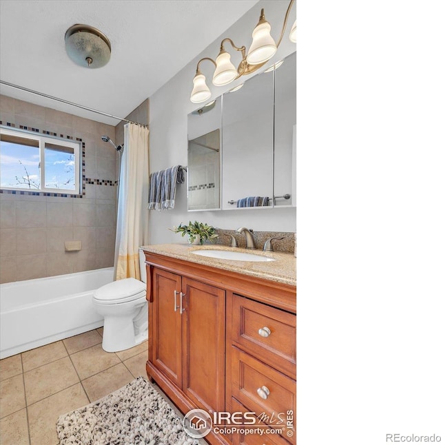 bathroom with vanity, shower / tub combo, tile patterned flooring, and toilet